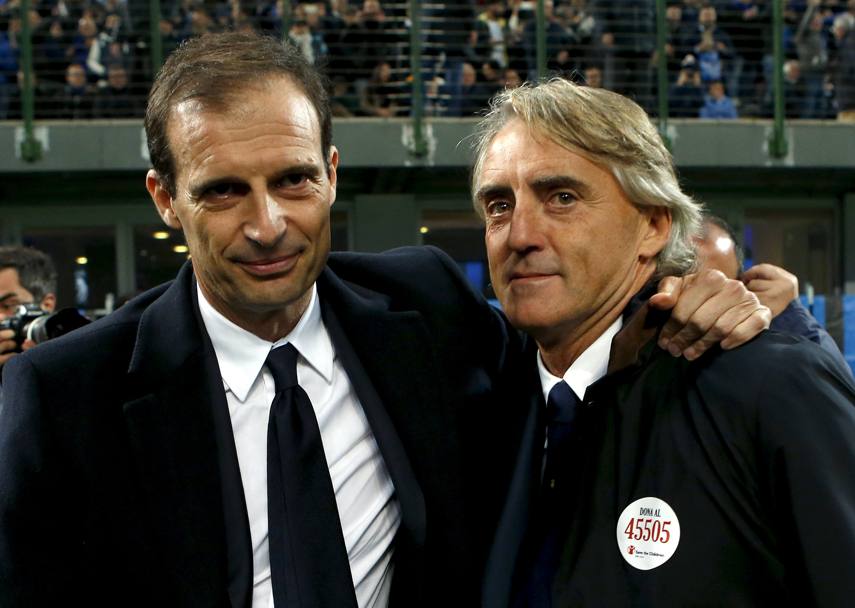 Allegri e Mancini: un abbraccio veloce prima del fischio d&#39;inizio. Reuters 